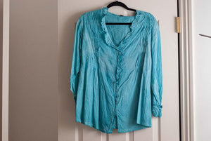 Turquoise  blue Boho style top with elastic waist in back.